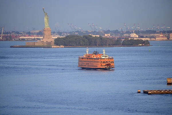 USA, America, New York, East River, staten isand ferry in front of statue of liberty