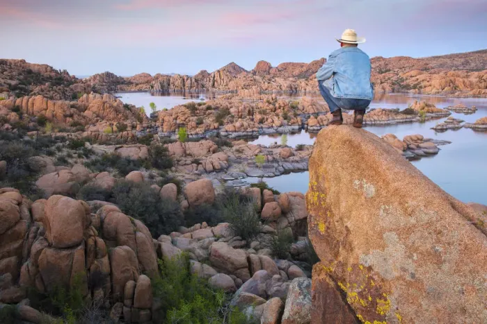 Framed Print : USA, Arizona, Prescott, Man watching the sunset at Watson Lake reservoir, MR Framed Print : USA, Arizona, Prescott, Man watching the sunset at Watson Lake reservoir, MR