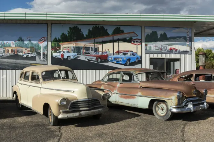 Framed Print : USA, Colorado, Delta County, Delta, Rusty cars parked outside shop Framed Print : USA, Colorado, Delta County, Delta, Rusty cars parked outside shop