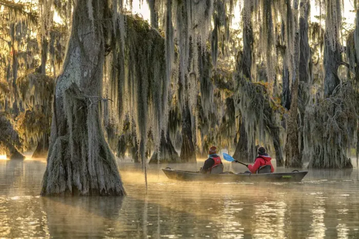 Framed Print : USA, Deep South, Louisiana, St. Martin Parish, Lake Martin, people in kayak at sunrise