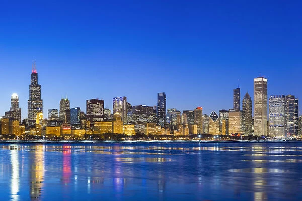 USA, Illinois, Chicago. The City Skyline and a frozen Lake Michigan from near the