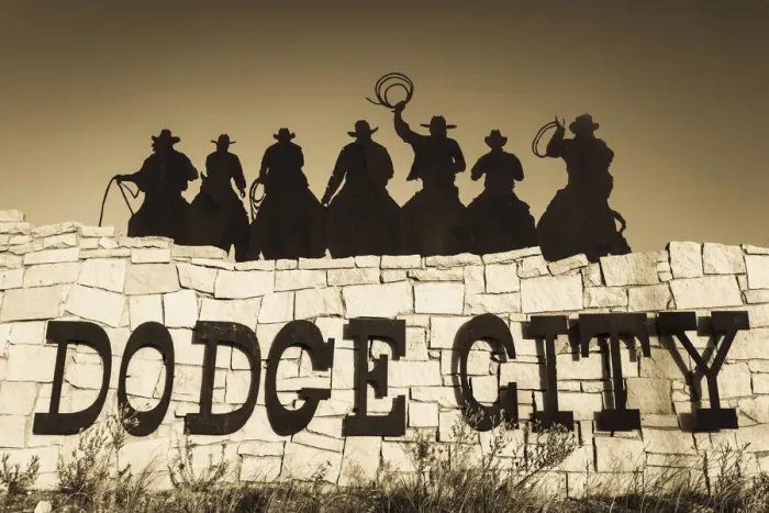 Framed Print : USA, Kansas, Dodge City, city sign with cowboy silhouettes Framed Print : USA, Kansas, Dodge City, city sign with cowboy silhouettes