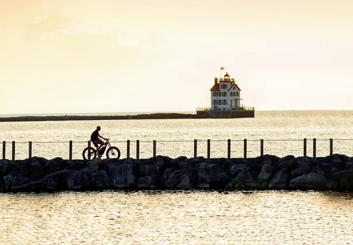 Framed Print : USA, Lorain, Ohio, Lake Erie, Lorain Lighthouse, Jewel Of The Port, Consistently Voted Best Lighthouse On Lake Erie, Bicycle Rider Along Sea Wall Framed Print : USA, Lorain, Ohio, Lake Erie, Lorain Lighthouse, Jewel Of The Port, Consistently Voted Best Lighthouse On Lake Erie, Bicycle Rider Along Sea Wall