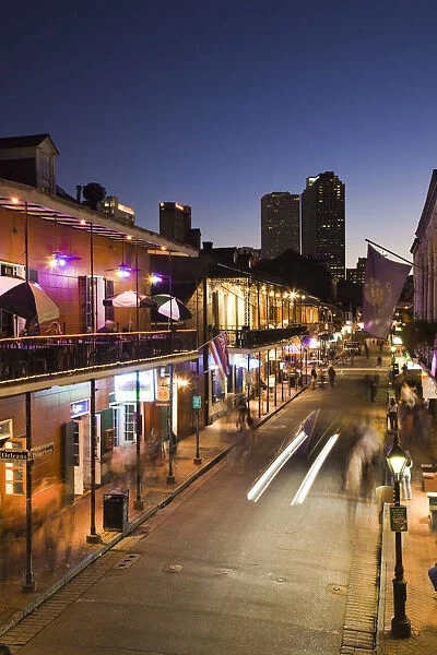USA, Louisiana, New Orleans, French Quarter, Bourbon Street and city skyline, elevated