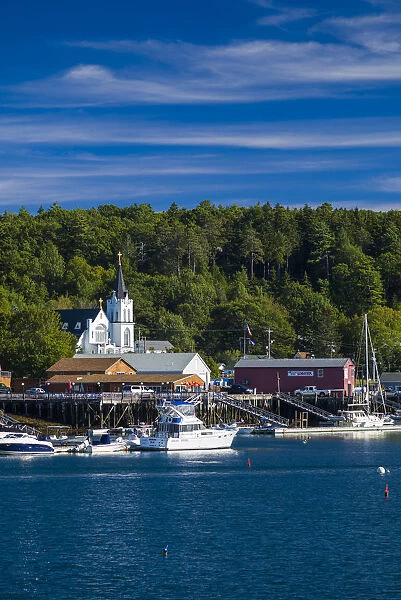 USA, Maine, Boothbay Harbor, harbor view with Our Lady Queen of Peace Catholic Church