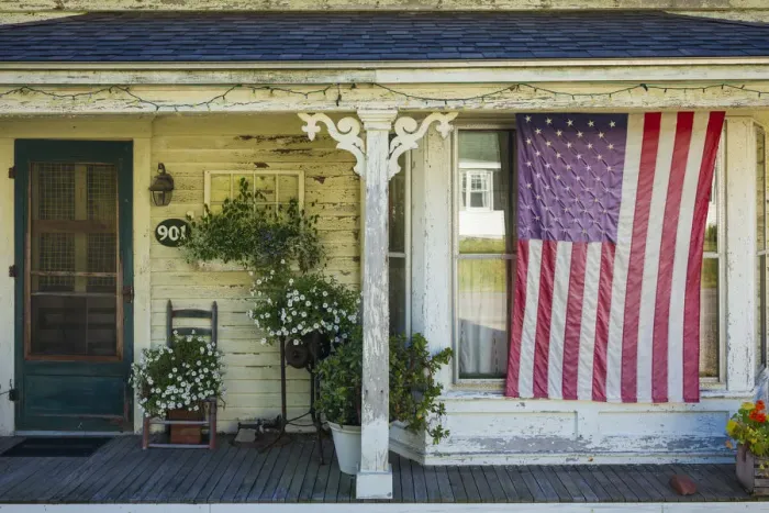 Framed Print : USA, Maine, Cundys Harbor, US flag on porch