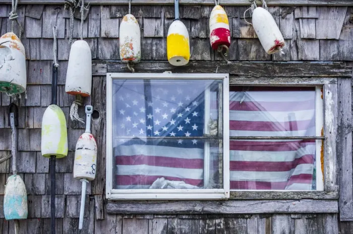 Framed Print : USA, Massachusetts, Cape Ann, Rockport, lobster buoys and US flag Framed Print : USA, Massachusetts, Cape Ann, Rockport, lobster buoys and US flag