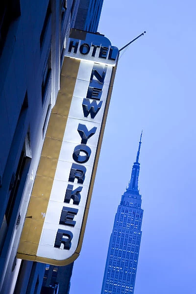 USA, New York City, Manhattan, New Yorker Hotel and Empire State Building