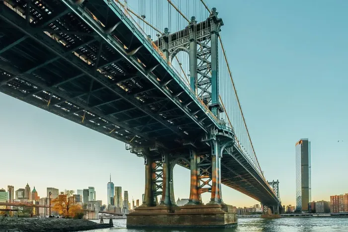 Framed Print : USA, New York City, view from below of the Manhattan bridge with the sun setting on lower Manhattan Framed Print : USA, New York City, view from below of the Manhattan bridge with the sun setting on lower Manhattan