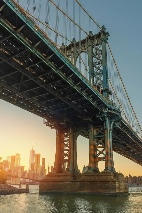 Framed Print : USA, New York City, view from below of the Manhattan bridge with the sun setting on lower Manhattan Framed Print : USA, New York City, view from below of the Manhattan bridge with the sun setting on lower Manhattan