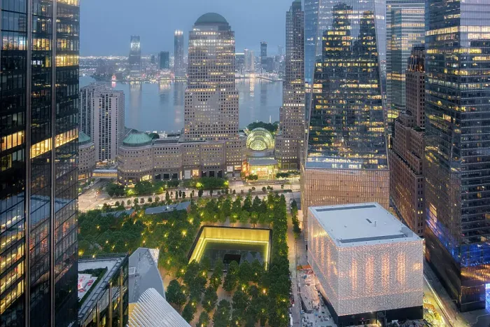 Framed Print : USA, New York, Lower Manhattan, World Trade Center, 9 / 11 Memorial & Park & Hudson River. Evening shot with illuminated buildings. Brookfield Place (architect Cesar Pelli; 1985) & PAC NYC Performing Arts Center (architect: Joshua Prince-Ramus, 2017) Framed Print : USA, New York, Lower Manhattan, World Trade Center, 9 / 11 Memorial & Park & Hudson River. Evening shot with illuminated buildings. Brookfield Place (architect Cesar Pelli; 1985) & PAC NYC Performing Arts Center (architect: Joshua Prince-Ramus, 2017)