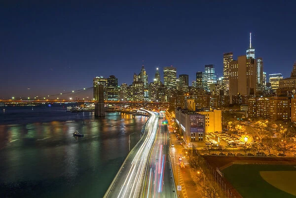 USA, New York, Lower Manhattan Skyline and Brooklyn Bridge over East River