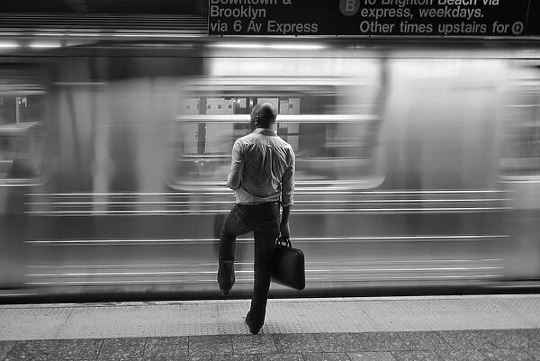 USA, New York, man in subway station