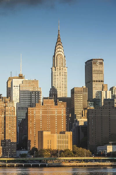 USA, New York, New York City, Long Island City, Mid town Manhattan skyline with Empire