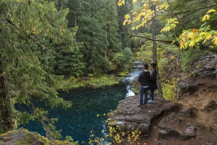 Framed Print : USA, Oregon, Willamette National Forest, Blue Pool on the McKenzie River, couple looking Framed Print : USA, Oregon, Willamette National Forest, Blue Pool on the McKenzie River, couple looking