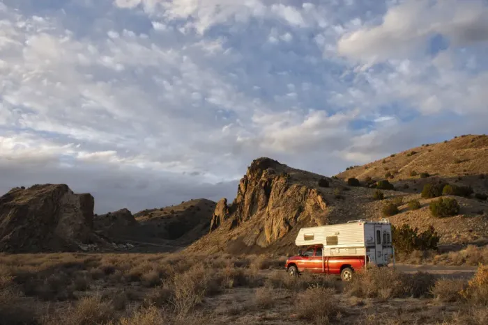 Framed Print : USA; Southwest, New Mexico; Cerrillos, Truck camper in desert