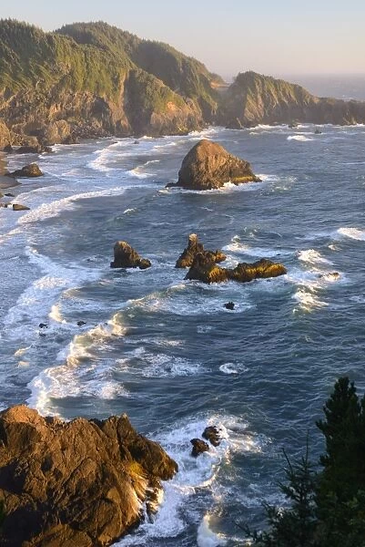 USA, West Coast, Oregon, State Scenic Corridor, Sunset with waves crashing