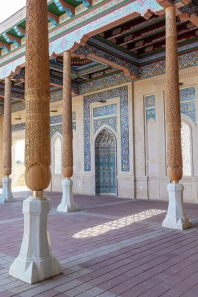 Uzbekistan, Samarkand, Hazrat Khizr Mosque, wooden carved pillars surround the main courtyard