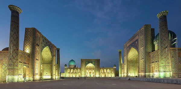 Uzbekistan, Samarkand, Registan square illuminated at sunset