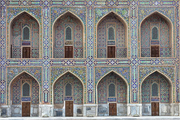 Uzbekistan, Samarkand, Registan square, doorways on the facade of Tilya-Kori Madrasah