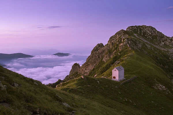 Val Grande, Piedmont, Italy. Landscape with mountain hut at sunrise