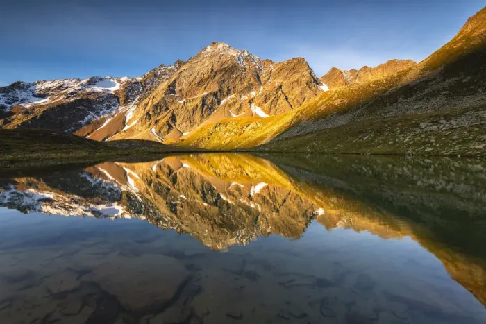 Framed Print : Valmalza lake during a sunrise in Camonica valley, Ponte di Legno, Brescia province