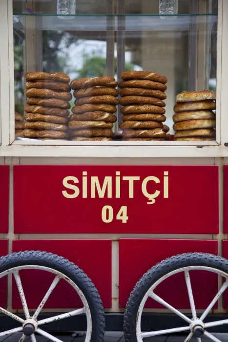 Framed Print : Vendor selling bread rools on red Trolley with Beyoglu area, Istanbul, Turkey Framed Print : Vendor selling bread rools on red Trolley with Beyoglu area, Istanbul, Turkey