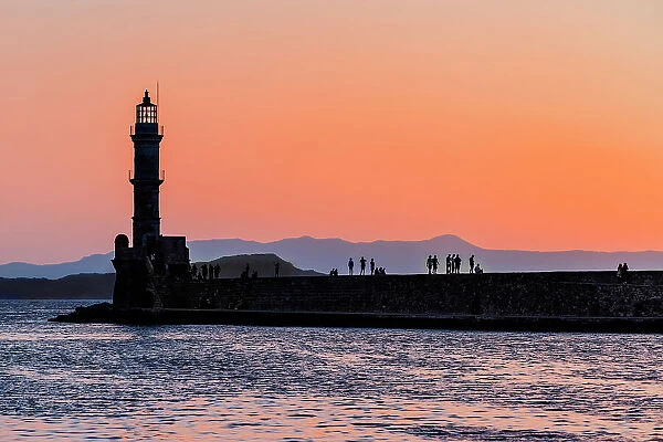 Venetian lighthouse at dusk, Chania, Crete, Greek Islands, Greece