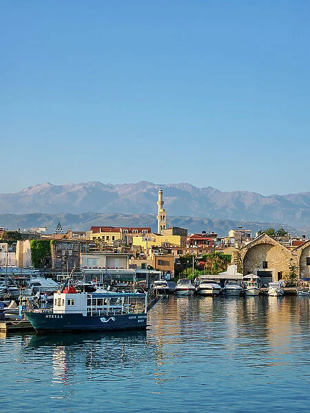 Venetian Shipyards and Old Town Marina at sunrise, City of Chania, Crete, Greece