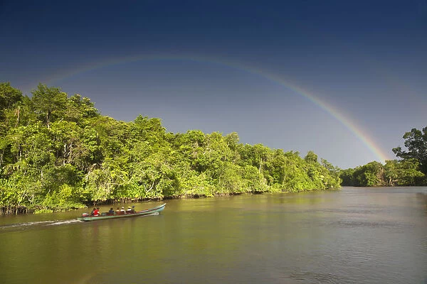 Venezuela, Delta Amacuro, Orinoco Delta, Rainbow over Nararina river