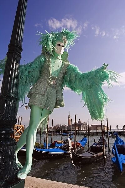 Venice Carnival People in Costumes and Masks on Canal with Gondolas