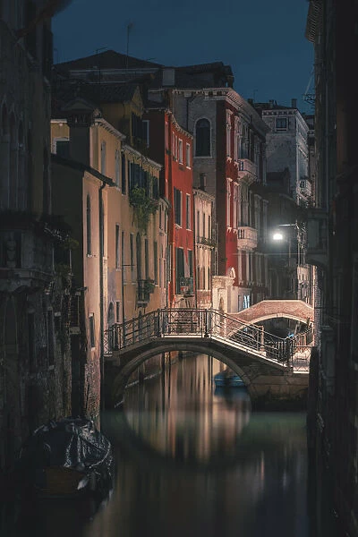Venice, Veneto, Italy. Backstreet canals in Castello at night