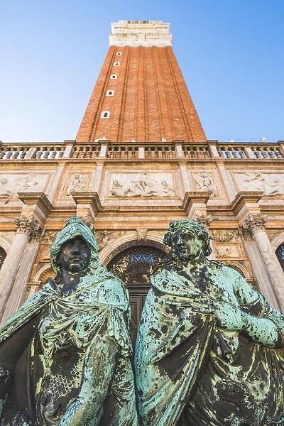 Venice, Veneto, Italy. Bronze statues on the gate to St Marks Campanile