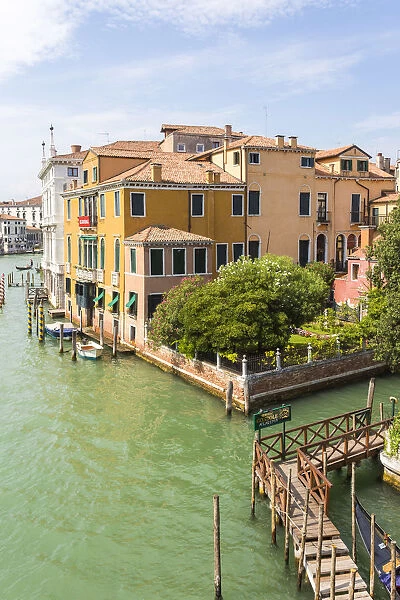 Venice, Veneto, Italy. Buildings and boats in the canals