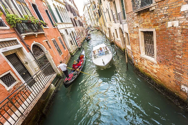 Venice, Veneto, Italy. Buildings and gondola