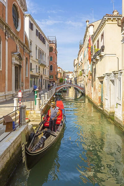 Venice, Veneto, Italy. Buildings and gondola