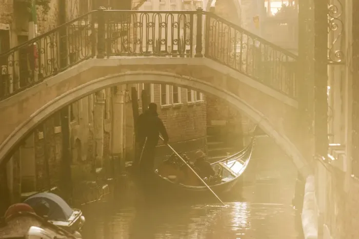 Framed Print : Venice, Veneto, Italy. Gondolier on a Gondola passing under a bridge, backlight view Framed Print : Venice, Veneto, Italy. Gondolier on a Gondola passing under a bridge, backlight view