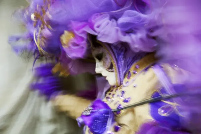 Framed Print : Venice, Veneto, Italy; A mask in movement on Piazza San Marco during Carnival Framed Print : Venice, Veneto, Italy; A mask in movement on Piazza San Marco during Carnival