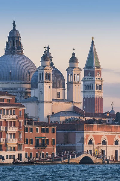 Venice, Veneto, Italy. St Marks Campanile and Salute (St Mary of Health)