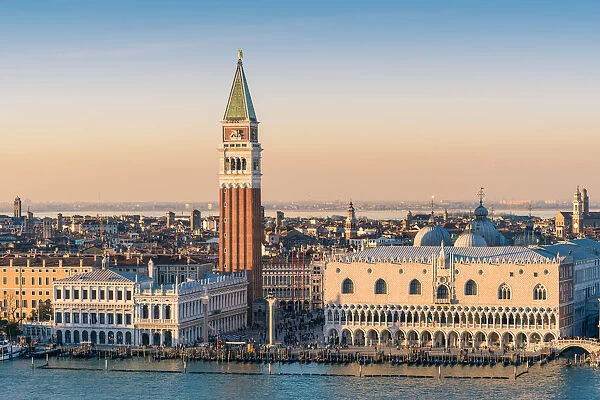Venice, Veneto, Italy. St Marks Square and Doges palace at sunset. High angle view