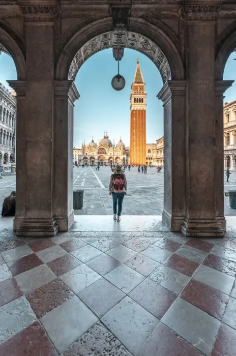Framed Print : Venice, Veneto, Italy. Woman tourist looking at St Marks Square Framed Print : Venice, Veneto, Italy. Woman tourist looking at St Marks Square