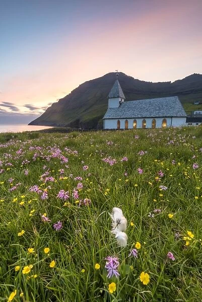 Vidareidi village, Vidoy island, Faroe Islands, Denmark. Villages church at sunset