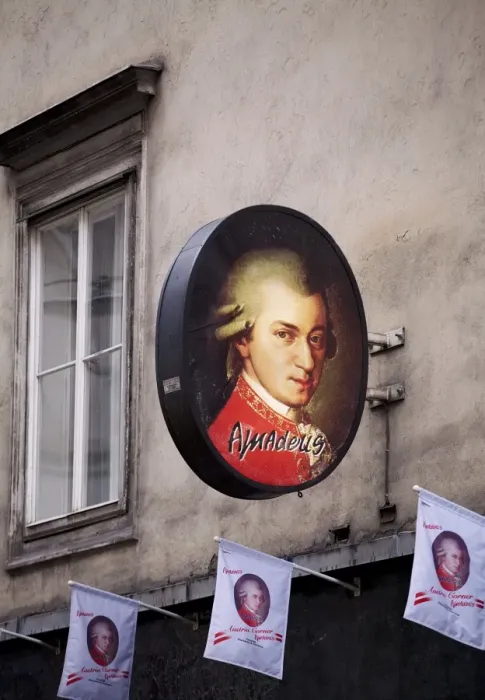 Framed Print : Vienna, Austria; An advert with the picture of famed Austrian composer Wolfgang Amadeus Mozart which serves as the picture of the famed Framed Print : Vienna, Austria; An advert with the picture of famed Austrian composer Wolfgang Amadeus Mozart which serves as the picture of the famed