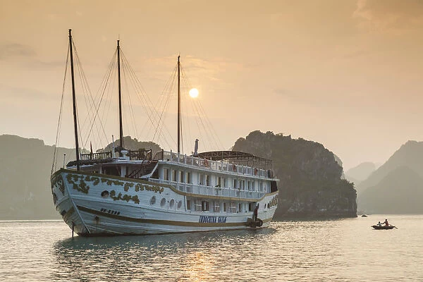 Vietnam, Halong Bay, tourist boats, dusk