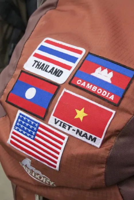 Framed Print : Vietnam, Hanoi, Backpack with Flags Framed Print : Vietnam, Hanoi, Backpack with Flags