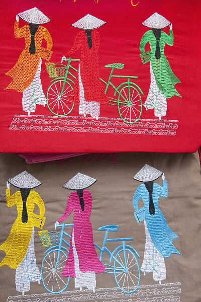 Vietnam, Hanoi, Needlework on Souvenir Handbag depicting Women in Traditional Ao-dai