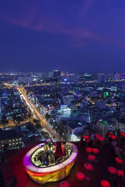 Vietnam, Ho Chi Minh City, elevated skyline view above the Chill Sky Bar, dusk