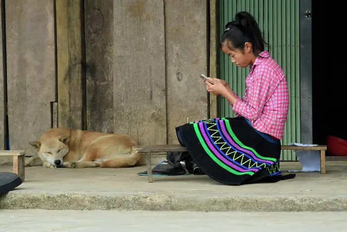 Framed Print : Vietnam, Northern, Hoang Len Son Mountains, Sapa, girl with phone Framed Print : Vietnam, Northern, Hoang Len Son Mountains, Sapa, girl with phone