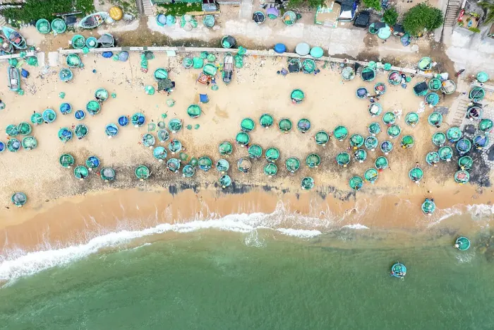 Framed Print : Vietnam, Phu Yen Province, Song Cau, an aerial view of basket boats on the beach