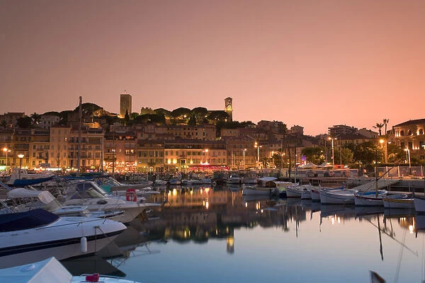 Vieux Port (Old Harbour) and old quarter of Le Suquet, dusk, Cannes, Cote D Azur